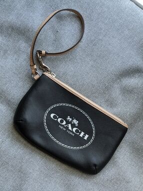Coach Black Wristlet with Beige Trim and White Logo
